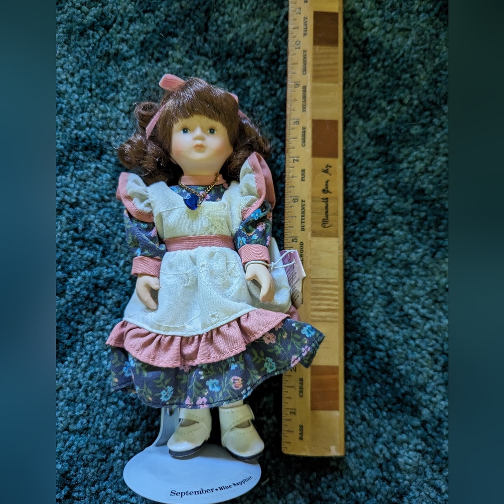 Russ.vintage porcelain doll. Mini. Birthstone.